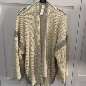 Anthropologie crochet kimono in cream.